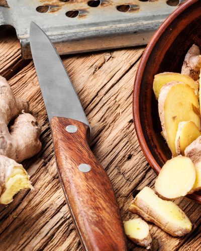 Fresh ginger root on the wooden table